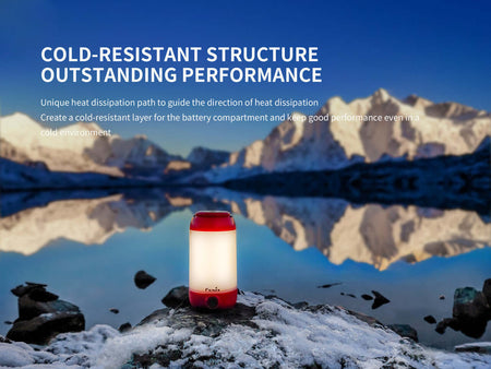 Fenix CL26R rechargeable camping lantern showcasing cold-resistant structure in a scenic outdoor setting.