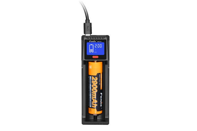 Fenix ARE-D1 Smart Battery Charger with LCD display charging a 2000mAh rechargeable battery.