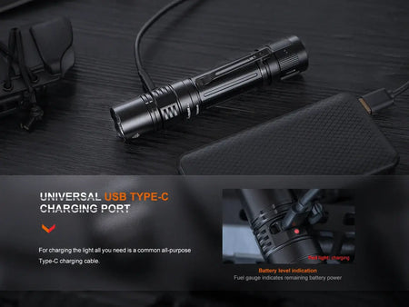 Fenix PD36R Pro flashlight with USB Type-C charging port and battery level indication.