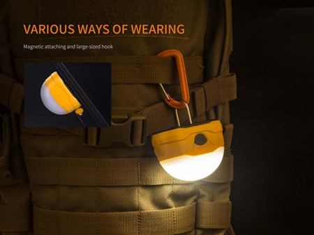 Fenix CL20R camping lantern featuring magnetic attachment and hook for versatile wearing options.