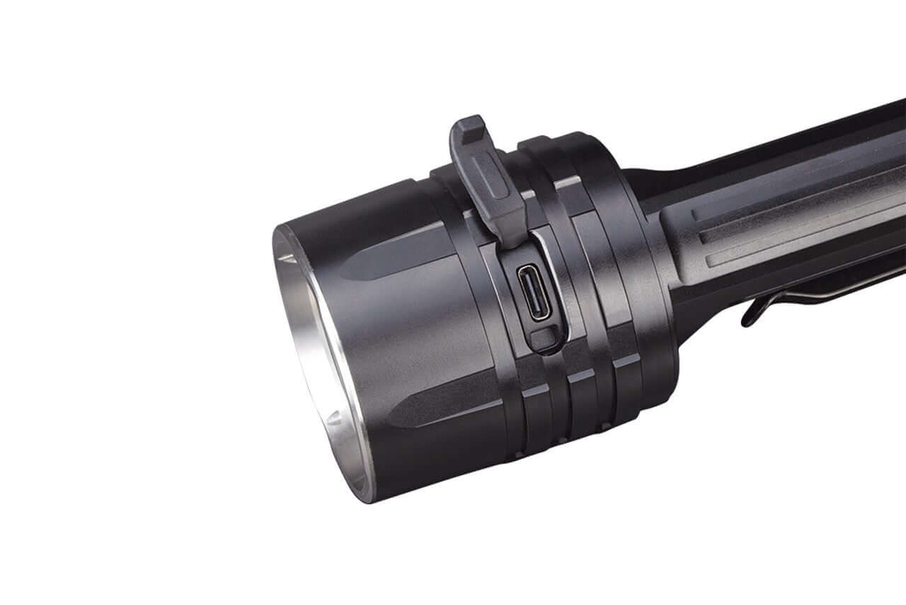 Close-up of Fenix LR35R rechargeable flashlight showing USB Type-C charging port and robust design.