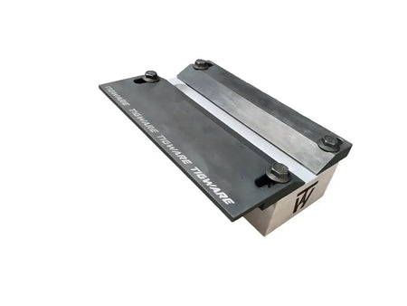 AERO Aerospace TIG welding test fixture with clamping plates and bolts for precision welding.