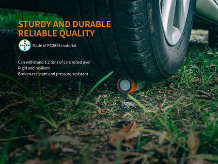 Close-up of a durable object under a tire, showcasing its sturdy quality and ability to withstand heavy weight.