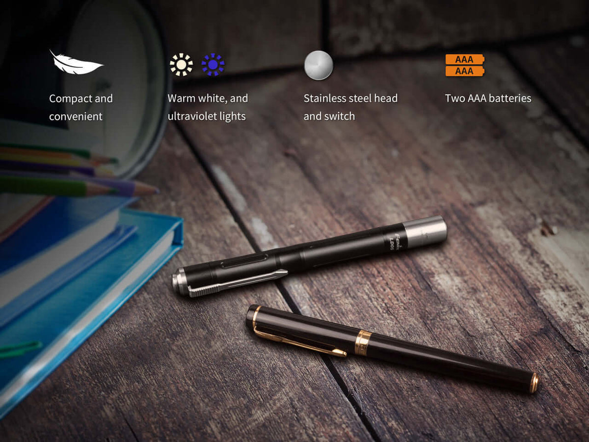 Fenix LD05 V2.0 EDC flashlight showcasing warm white and UV lights, stainless steel switch, compact design with two AAA batteries.
