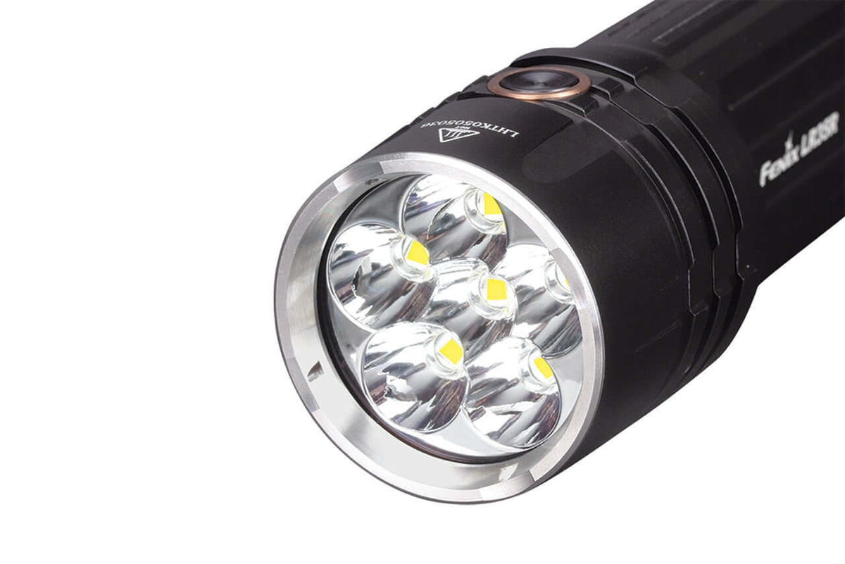 Close-up of Fenix LR35R rechargeable flashlight with six bright LEDs and a durable design.
