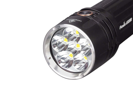 Close-up of Fenix LR35R rechargeable flashlight with six bright LEDs and a durable design.