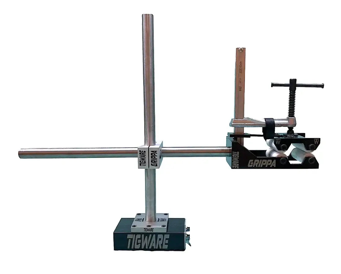 GRIPPA work holding tool for intake and exhaust systems, designed to secure round tubing from 2" to 4" in an elevated position.