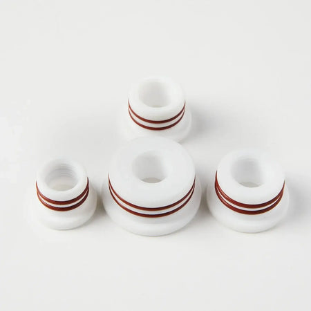 Set of four Teflon Beaver Unit Adapter O-rings, designed for durability and resistance under normal use.