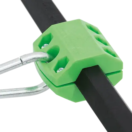 Green reusable clamp securely holding round and hex shank tool bodies, designed for safety and durability.