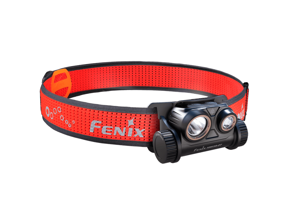 Fenix HM65R-DT magnesium headlamp features dual spotlights and adjustable strap for trail running illumination.